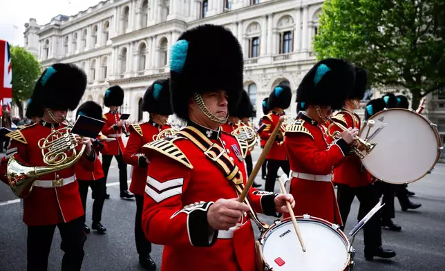 Irish Guards march past the Cenotaph, in Whitehall, during the VE Day 80th anniversary parade, in London, Monday, May 5, 2025. (Benjamin Cremel/Pool Photo via AP)