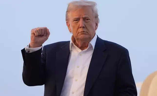 President Donald Trump arrives on Air Force One at Joint Base Andrews, Md., Sunday, May 4, 2025. (AP Photo/Manuel Balce Ceneta)