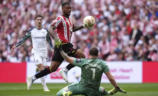 Sheffield United's Tyrese Campbell scores his side's first goal of the game during the Sky Bet Championship play off final between Sheffield United and Sunderland, at Wembley Stadium, London, Saturday May 24, 2025. (John Walton/PA via AP)