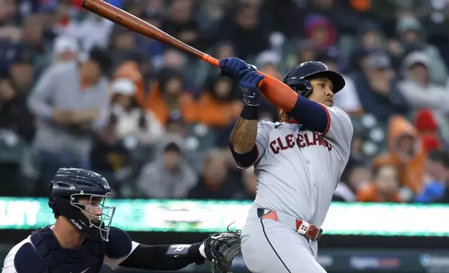 Cleveland Guardians' José Ramírez singles against the Detroit Tigers during the fourth inning of a baseball game Thursday, May 22, 2025, in Detroit. (AP Photo/Duane Burleson)