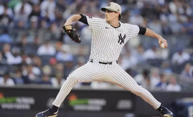 New York Yankees' Max Fried pitches during the first inning of a baseball game against the New York Mets Sunday, May 18, 2025, in New York. (AP Photo/Frank Franklin II)