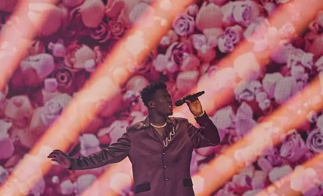 Claude from the Netherlands performs the song "C'est La Vie" during the first semi-final of the 69th Eurovision Song Contest, in Basel, Switzerland, Tuesday, May 13, 2025. (AP Photo/Martin Meissner)