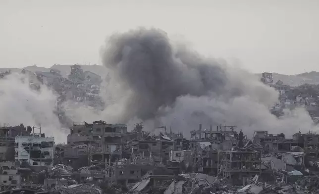 Smoke rises following an Israeli army airstrike in northern Gaza Strip, seen from southern Israel, Friday, May 16, 2025. (AP Photo/Maya Alleruzzo)