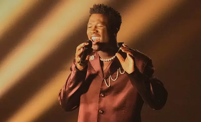Claude from the Netherlands performs the song "C'est La Vie" during the first semi-final of the 69th Eurovision Song Contest, in Basel, Switzerland, Tuesday, May 13, 2025. (AP Photo/Martin Meissner)