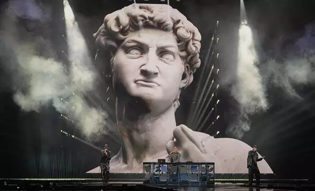Gabry Ponte from San Marino performs the song "Tutta L'Italia" during the first semi-final of the 69th Eurovision Song Contest, in Basel, Switzerland, Tuesday, May 13, 2025. (AP Photo/Martin Meissner)