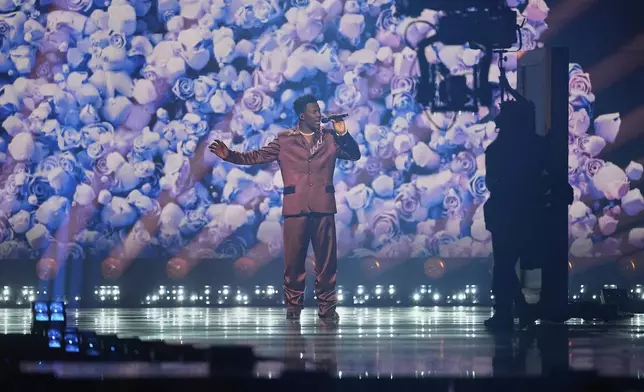 Claude from the Netherlands performs the song "C'est La Vie" during the first semi-final of the 69th Eurovision Song Contest, in Basel, Switzerland, Tuesday, May 13, 2025. (AP Photo/Martin Meissner)