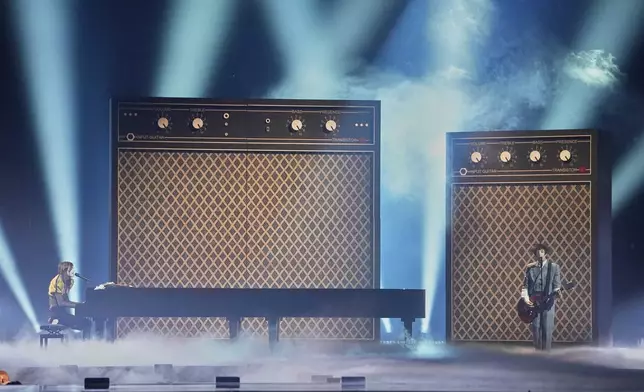 Lucio Corsi from Italy performs the song "Volevo Essere Un Duro" during the first semi-final of the 69th Eurovision Song Contest, in Basel, Switzerland, Tuesday, May 13, 2025. (AP Photo/Martin Meissner)