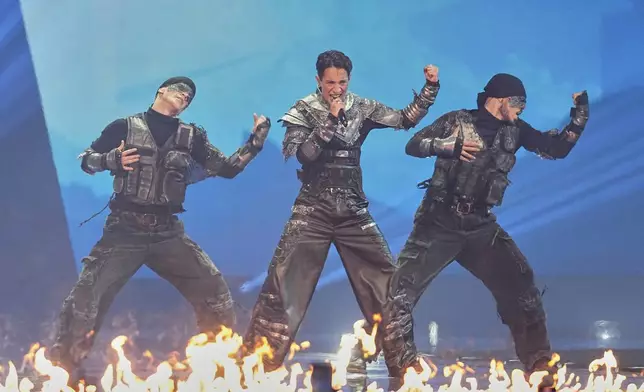 Kyle Alessandro from Norway performs the song "Lighter" during the first semi-final of the 69th Eurovision Song Contest, in Basel, Switzerland, Tuesday, May 13, 2025. (AP Photo/Martin Meissner)