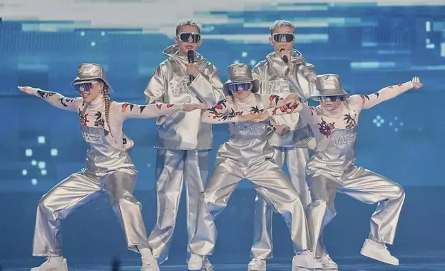 VAEB from Iceland performs the song "ROA" during the first semi-final of the 69th Eurovision Song Contest, in Basel, Switzerland, Tuesday, May 13, 2025. (AP Photo/Martin Meissner)