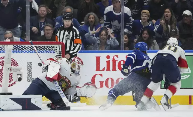 Toronto Maple Leafs forward William Nylander (88) scores on Florida Panthers goaltender Sergei Bobrovsky (72) during the first period of Game 1 in an NHL hockey second-round playoff series in Toronto, Monday, May 5, 2025. (Nathan Denette/The Canadian Press via AP)