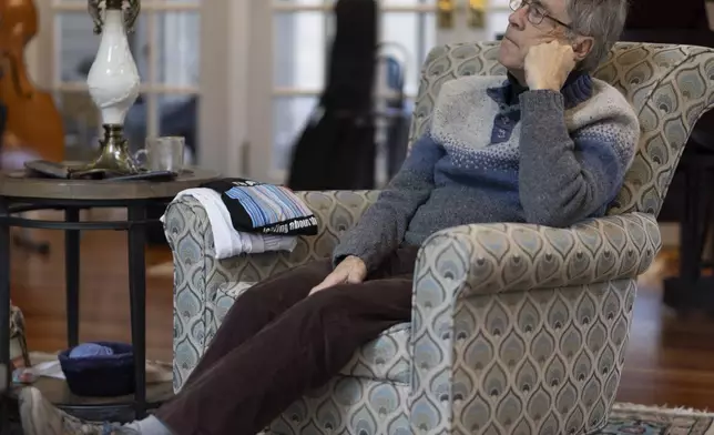Jon Randall listens during an interview with The Associated Press at his home on Saturday, March 22, 2025, in Webster, N.Y. (Toni Duncan via AP)