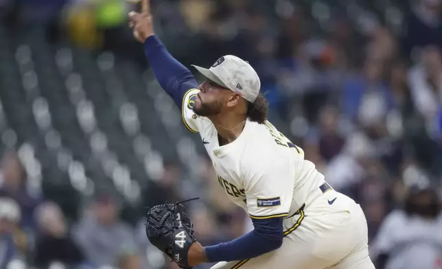 Milwaukee Brewers starting pitcher Freddy Peralta throws to the Minnesota Twins during the first inning of a baseball game, Sunday, May 18, 2025, in Milwaukee. (AP Photo/Jeffrey Phelps)