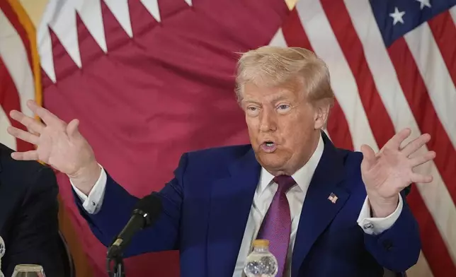 President Donald Trump gestures during a business roundtable, Thursday, May 15, 2025, in Doha, Qatar. (AP Photo/Alex Brandon)