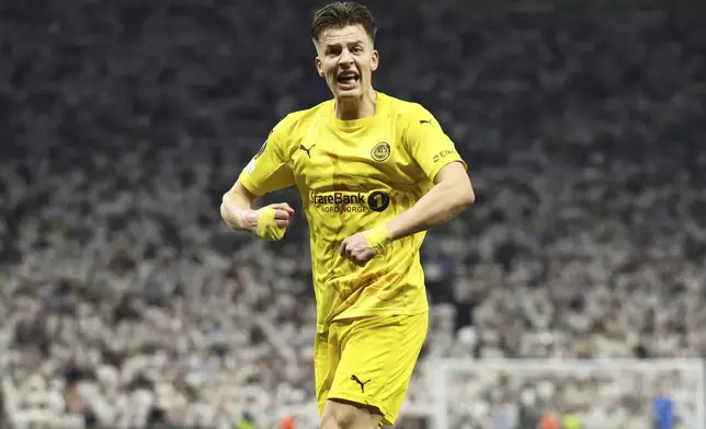 Glimt's Jostein Gundersen celebrates his side's first goal during the Europa League semifinal first leg soccer match between Tottenham Hotspur and Bodo/Glimt at the White Hart Lane stadium in London, Thursday, May 1, 2025. (AP Photo/Ian Walton)