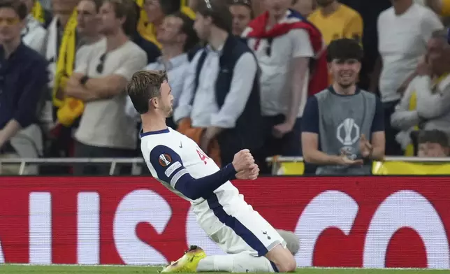 Tottenham's James Maddison celebrates after scoring his side's second goal during the Europa League semifinal first leg soccer match between Tottenham Hotspur and Bodo/Glimt at the White Hart Lane stadium in London, Thursday, May 1, 2025. (AP Photo/Kirsty Wigglesworth)