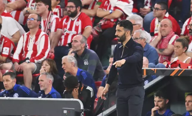 Manchester United's head coach Ruben Amorim reacts during the Europa League semifinal first leg soccer match between Athletic Bilbao and Manchester United at the San Mames stadium in Bilbao, Spain, Thursday, May 1, 2025. (AP Photo/Miguel Oses)
