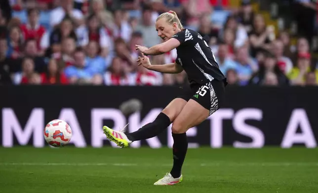 Arsenal's Stina Blackstenius scores their side's first goal of the game during the English Women's Super League soccer match between Aston Villa and Arsenal at Villa Park in Birmingham, Wednesday April 30, 2025. (David Davies/PA via AP)