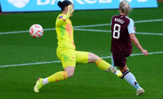Aston Villa's Jordan Nobbs scores their side's first goal of the game during the English Women's Super League soccer match between Aston Villa and Arsenal at Villa Park in Birmingham, Wednesday April 30, 2025. (David Davies/PA via AP)