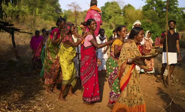 Members of the Durua tribe, part of India's Indigenous Adivasis communities, perform traditional dances during the Chaitra Parab festival, a month long harvest celebration in Pongan Pani village, Koraput district, in India's eastern state of Odisha, Wednesday, April 16, 2025. (AP Photo/Rafiq Maqbool)