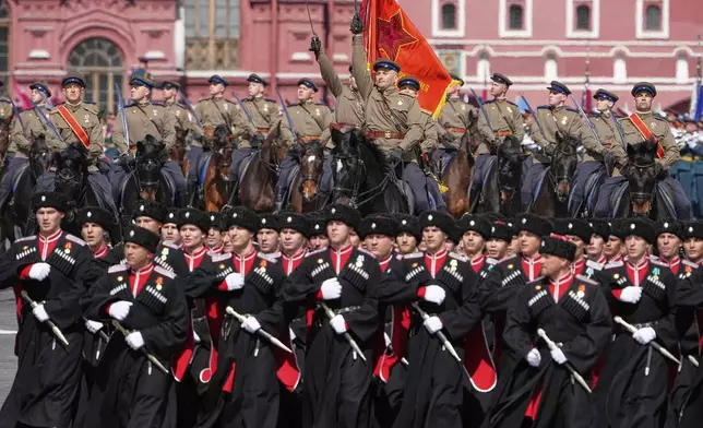 Russian servicemen attend the Victory Day military parade in Moscow, Russia, Friday, May 9, 2025, during celebrations of the 80th anniversary of the Soviet Union's victory over Nazi Germany during the World War II. (AP Photo/Alexander Zemlianichenko)