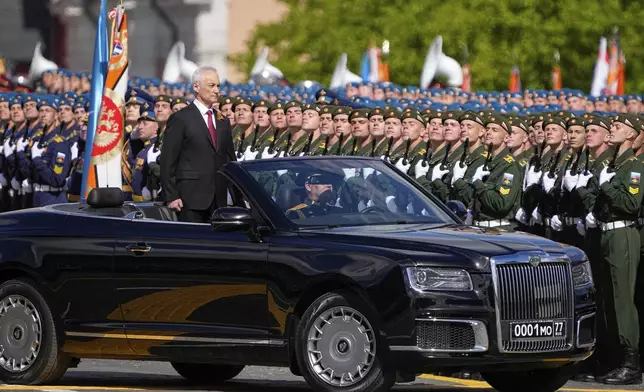 Russian Defense Minister Andrei Belousov is driven along Red Square in an Aurus car during the Victory Day military parade in Moscow, Russia, Friday, May 9, 2025, in celebrations of the 80th anniversary of the Soviet Union's victory over Nazi Germany during the World War II. (AP Photo/Alexander Zemlianichenko)