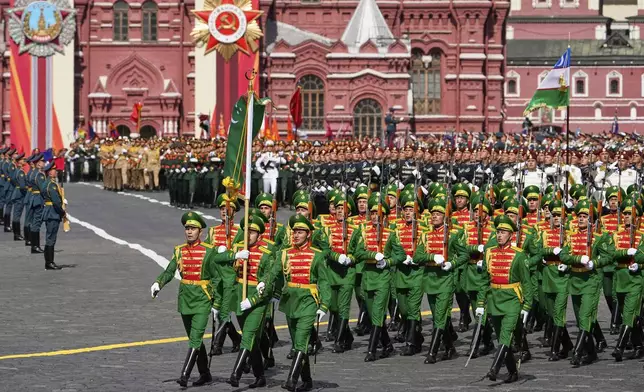 Turkmenistan servicemen attend the Victory Day military parade in Moscow, Russia, Friday, May 9, 2025, during celebrations of the 80th anniversary of the Soviet Union's victory over Nazi Germany during the World War II. (AP Photo/Alexander Zemlianichenko)