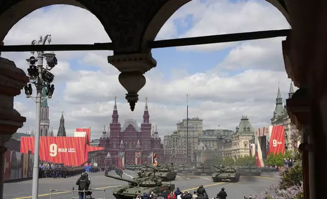 Russian army tanks roll in Red Square during the Victory Day military parade in Moscow, Russia, Friday, May 9, 2025, during celebrations of the 80th anniversary of the Soviet Union's victory over Nazi Germany during the World War II. (AP Photo/Alexander Zemlianichenko)