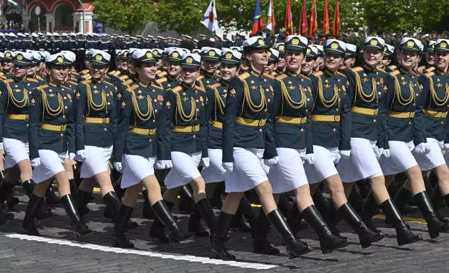 Russian servicewomen march during the Victory Day military parade in Moscow, Russia, Friday, May 9, 2025, during celebrations of the 80th anniversary of the Soviet Union's victory over Nazi Germany during the World War II. (Ilya Pitalev/Photo host agency RIA Novosti via AP)