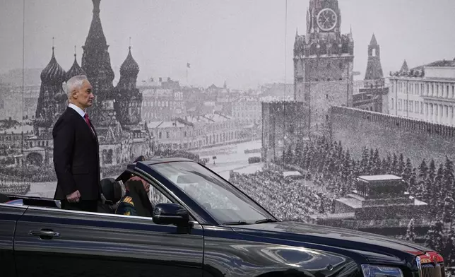 Russian Defense Minister Andrei Belousov is driven along Red Square in an Aurus car during the Victory Day military parade in Moscow, Russia, Friday, May 9, 2025, in celebrations of the 80th anniversary of the Soviet Union's victory over Nazi Germany during the World War II. (AP Photo/Alexander Zemlianichenko)