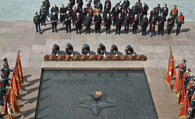 Foreign leaders attend a wreath laying ceremony at the Tomb of the Unknown Soldier in Alexander Garden after the Victory Day military parade in Moscow, Russia, Friday, May 9, 2025, during celebrations of the 80th anniversary of the Soviet Union's victory over Nazi Germany during the World War II. (Ivan Sekretarev/Photo host agency RIA Novosti via AP)
