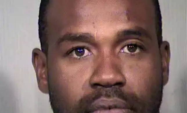 FILE - This undated file booking photo provided by the Maricopa County Sheriff's Office shows Cleophus Cooksey Jr. (Maricopa County Sheriff's Office via AP, File)