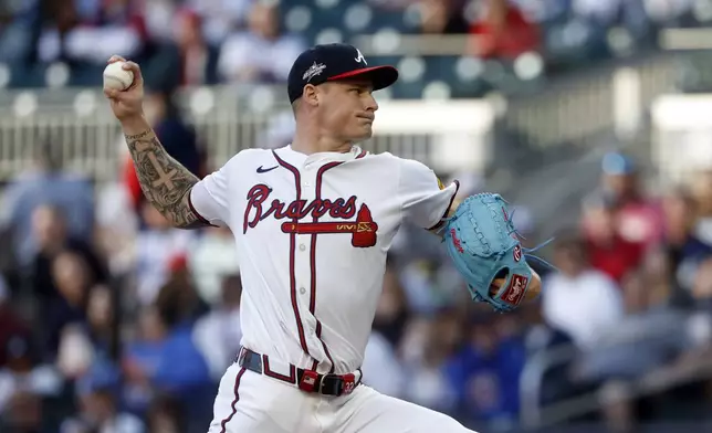 Atlanta Braves pitcher AJ Smith-Shawver throws during the first inning of a baseball game against the Cincinnati Reds, Monday, May 5, 2025, in Atlanta. (AP Photo/Butch Dill)
