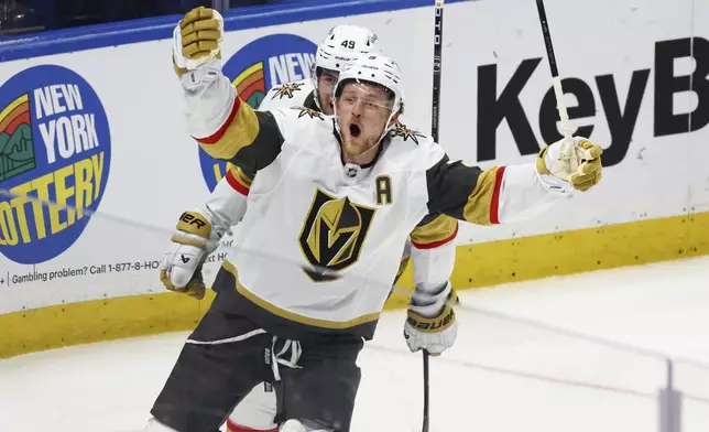 File- Vegas Golden Knights center Jack Eichel (9) celebrates his goal during the third period of an NHL hockey game against the Buffalo Sabres, March 15, 2025, in Buffalo, N.Y. (AP Photo/Jeffrey T. Barnes, File)