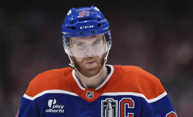 FILE - Edmonton Oilers' Connor McDavid skates during a stoppage in play during the second period in Game 2 of the NHL Stanley Cup Final against the Florida Panthers, in Edmonton, on June 6, 2025. (Darryl Dyck/The Canadian Press via AP, File)