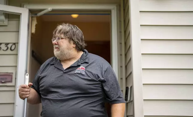 David Carlson, Vance Boelter's best friend since fourth grade, tears up as he talks about Boelter outside their shared residence on Fremont Ave. N. in Minneapolis, Minn., Saturday, June 14, 2025. (Alex Kormann/Star Tribune via AP)