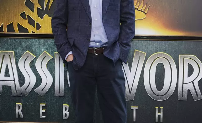 David Koepp poses for photographers upon arrival at the premiere of the film 'Jurassic World Rebirth' on Tuesday, June 17, 2025, in London. (Photo by Scott A Garfitt/Invision/AP)