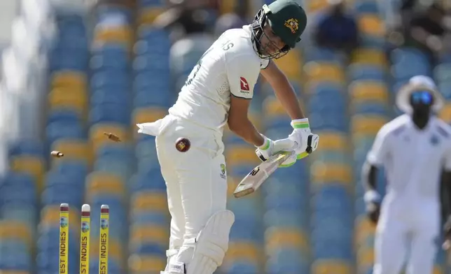 Australia's Sam Konstas is bowled by West Indies' Shamar Joseph on day two of the first cricket Test match at Kensington Stadium in Bridgetown, Barbados, Thursday, June 26, 2025. (AP Photo/Ricardo Mazalan)