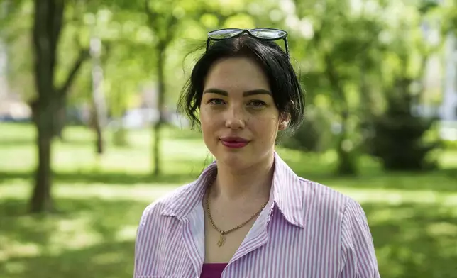 Olha Kurtmalaieva stands in a park in Kyiv, Ukraine, on Wednesday, April 23, 2025. (AP Photo/Evgeniy Maloletka)