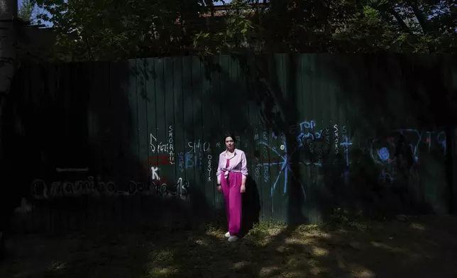 Olha Kurtmalaieva stands in a park in Kyiv, Ukraine, on Wednesday, April 23, 2025. (AP Photo/Evgeniy Maloletka)