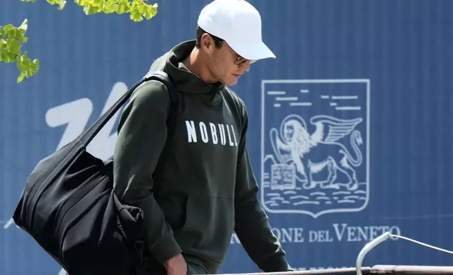 Former NFL quarterback Tom Brady arrives for the weekend wedding of Amazon founder Jeff Bezos and Lauren Sanchez, in Venice, Italy, Thursday, June 26, 2025. (AP Photo/Luca Bruno)