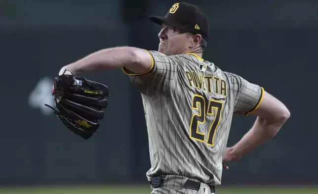 San Diego Padres pitcher Nick Pivetta throws against the Arizona Diamondbacks in the first inning during a baseball game, Sunday, June 15, 2025, in Phoenix. (AP Photo/Rick Scuteri)