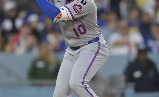 New York Mets' Ronny Mauricio at bat during the second inning of a baseball game against the Los Angeles Dodgers, Tuesday, June 3, 2025, in Los Angeles. (AP Photo/Jayne Kamin-Oncea)