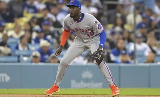New York Mets' Ronny Mauricio gets set at third base during the first inning of a baseball game against the Los Angeles Dodgers, Tuesday, June 3, 2025, in Los Angeles. (AP Photo/Jayne Kamin-Oncea)