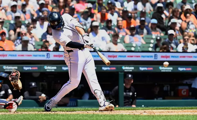 Detroit Tigers' Spencer Torkelson singles during the third inning of a baseball game against the Minnesota Twins, Saturday, June 28, 2025, in Detroit. (AP Photo/Jose Juarez)