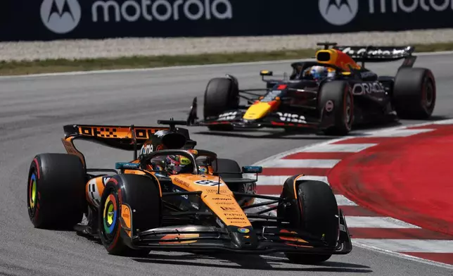 McLaren driver Oscar Piastri of Australia steers his car during the Spanish Grand Prix Formula One race at the Barcelona Catalunya racetrack in Montmelo, near Barcelona, Spain, Sunday, June 1, 2025. (AP Photo/Joan Monfort)