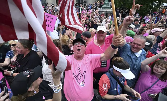 Supporters of Karen Read react after she was found not guilty of second-degree murder on Wednesday, June 18, 2025, in Dedham, Mass. (AP Photo/Josh Reynolds)