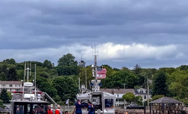 In this photo provided by the Branford Fire Department, Branford firefighters and the Coast Guard respond to a plane crash in the Long Island Sound, on Sunday, June 1, 2025, off the coast of Branford, Conn. (Branford Fire Department via AP)