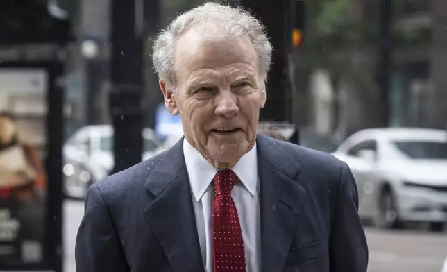 Illinois' former House Speaker Michael Madigan walks into the Dirksen Federal Courthouse for his sentencing hearing, Friday, June 13, 2025, in Chicago. (Ashlee Rezin/Chicago Sun-Times via AP)