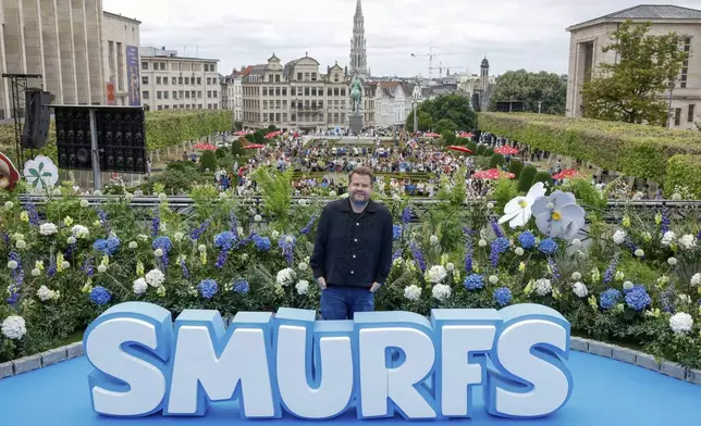 James Corden poses for photographers upon arrival at the world premiere of the film "Smurfs", on Saturday, June 28, 2025, in Brussels. (AP Photo/Omar Havana).