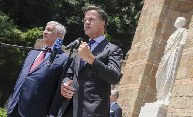 Italy's Foreign Minister Antonio Tajani, left, and Mark Rutte, NATO Secretary General, prior to the "Weimar Plus" Ministerial meeting dedicated to Ukraine and European security in Rome, Italy, Thursday, June 12, 2025. (Mauro Scrobogna/LaPresse via AP)